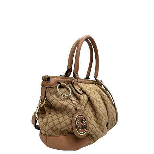 Borsa Gucci Diamante in tessuto beige con finiture in pelle rosa, munita di doppi manici e una tracolla amovibile e regolabile, di lusso, originale, ottime condizioni, usata.