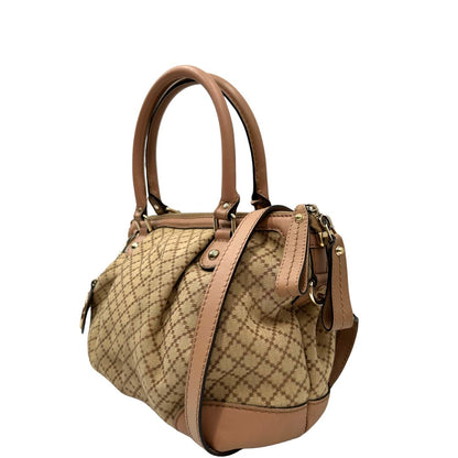 Borsa Gucci Diamante in tessuto beige con finiture in pelle rosa, munita di doppi manici e una tracolla amovibile e regolabile, di lusso, originale, ottime condizioni, usata.