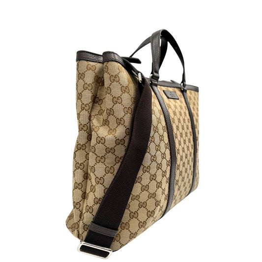 lato Capiente cartella Gucci in tessuto GG con finiture in pelle marroni, di lusso, originale, ottime condizioni, usata  