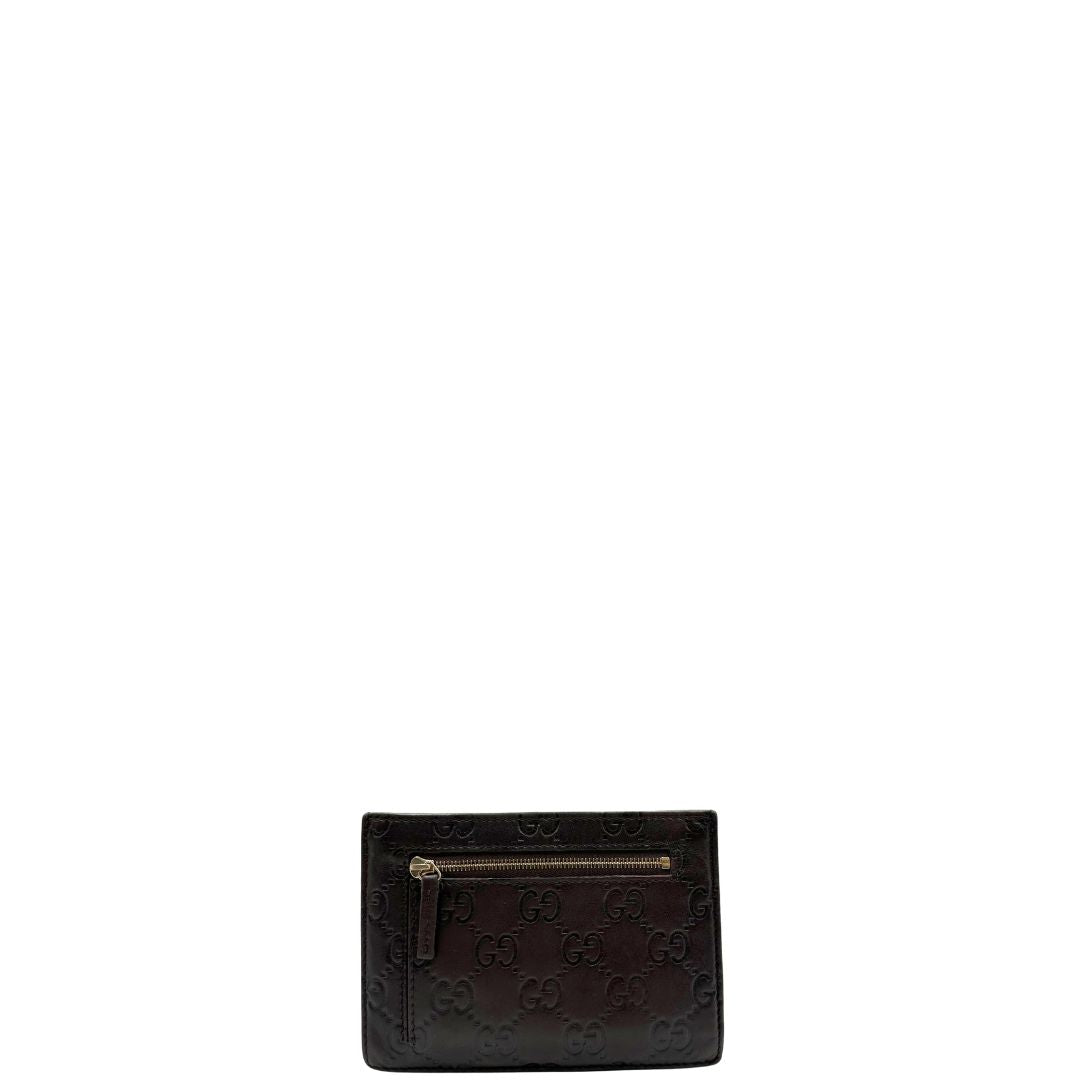  Portacarte Gucci in pelle marrone trama Guccissima, di lusso, originale, ottime condizioni, usato.