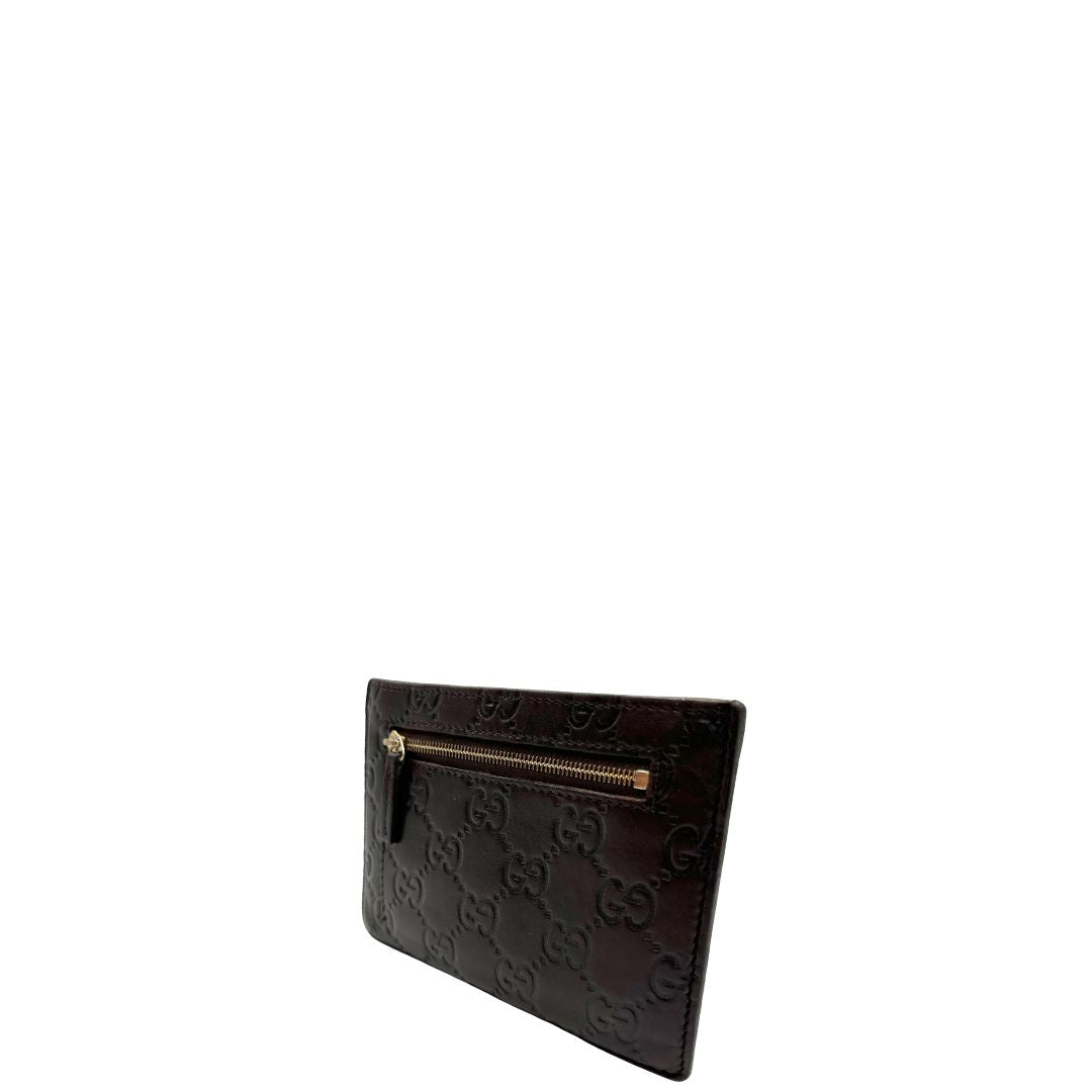 lato  Portacarte Gucci in pelle marrone trama Guccissima, di lusso, originale, ottime condizioni, usato. 