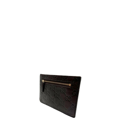 lato  Portacarte Gucci in pelle marrone trama Guccissima, di lusso, originale, ottime condizioni, usato. 
