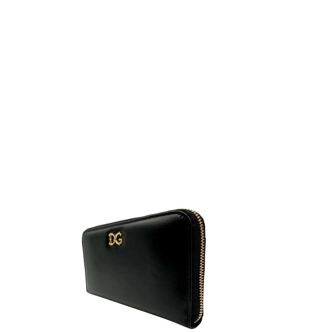 Laterale destro di un portafoglio D&G in morbida pelle nera, con logo gioiello sul front, completo di corredo, usato, originale, second hand, in condizioni eccellenti.