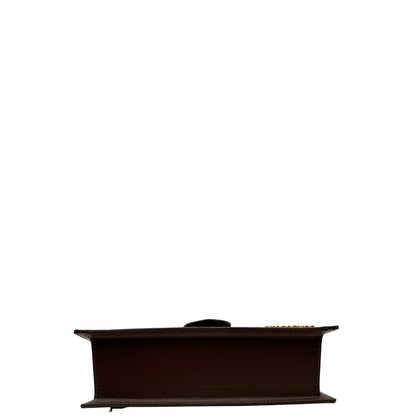 Base, Borsa Jacquemus nella versione Le Grand Bambino in pelle color marrone cioccolato, da portare a mano o a tracolla. Originale, usata, di lusso, in ottime condizioni.