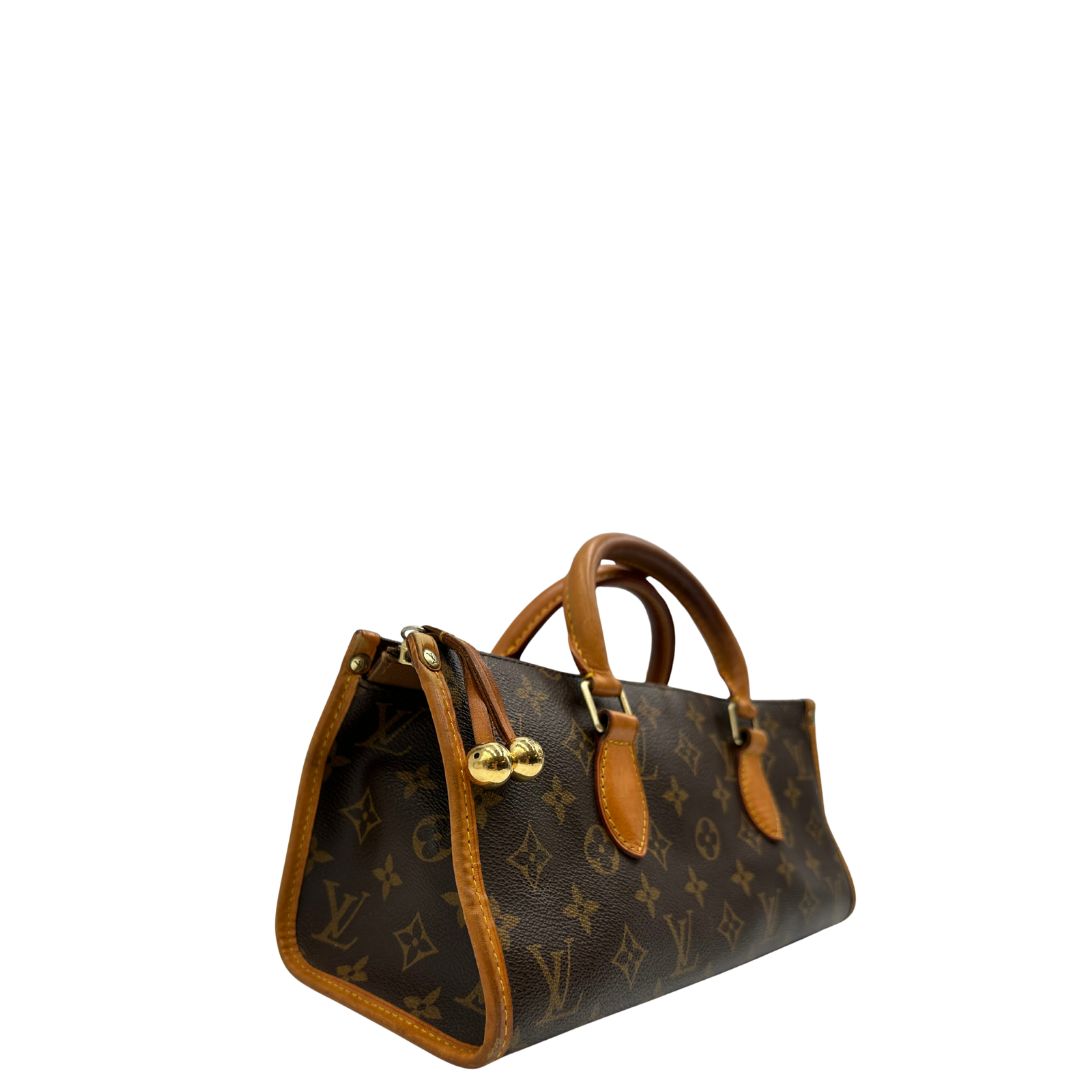 lato Borsa LV in canvas monogram e finiture in vacchetta naturale, di lusso, originale, ottime condizioni. 