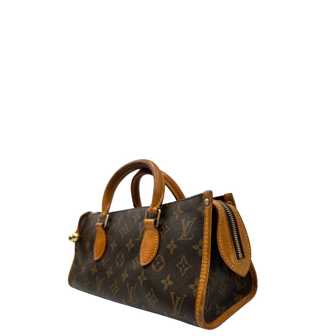 lato  Borsa LV in canvas monogram e finiture in vacchetta naturale, di lusso, originale, ottime condizioni. 