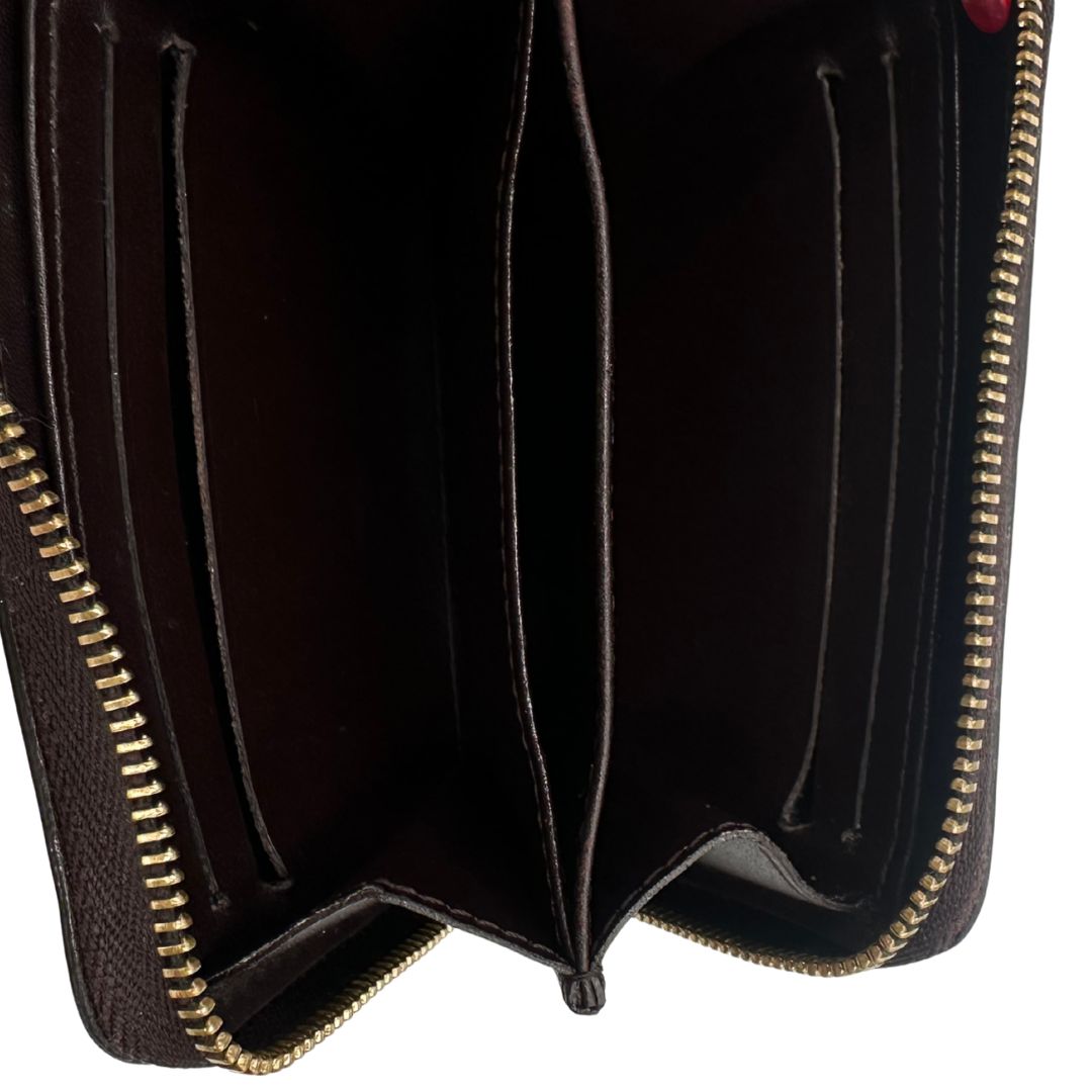 Portafoglio Louis Vuitton in pelle vernis monogram bordeaux