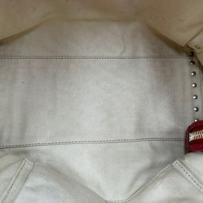 interno Borsa V. G. in pelle rossa impreziosita da borchie piramidali dorate, di lusso, originale, ottime condizioni, usata. 
