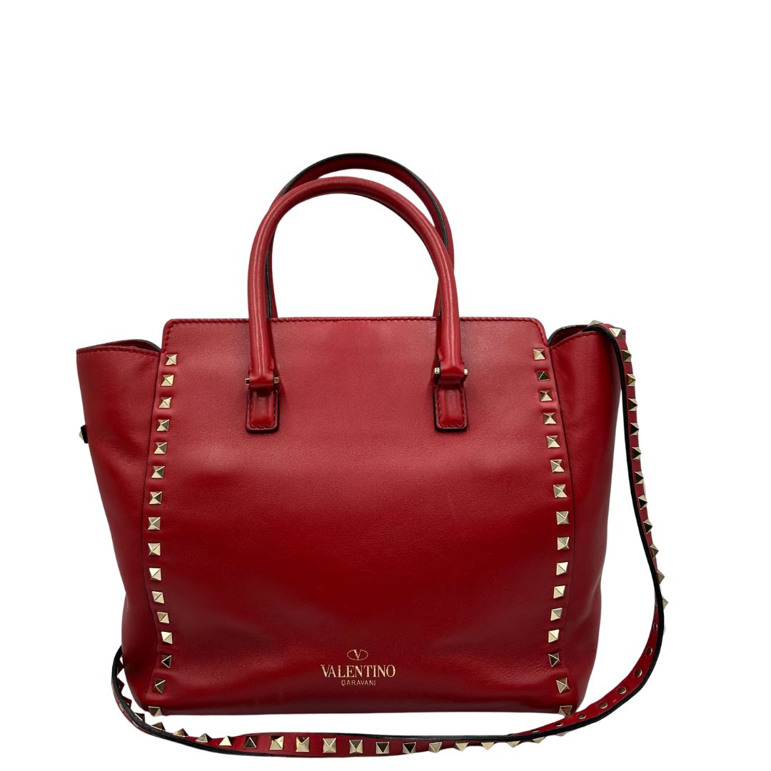 retro Borsa V. G. in pelle rossa impreziosita da borchie piramidali dorate, di lusso, originale, ottime condizioni, usata. 
