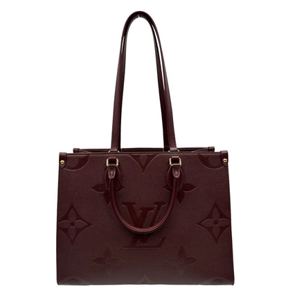 front  Louis Vuitton OnTheGo nella versione MM in pelle monogram Empreinte color bordeaux, di lusso, originale, ottime condizioni, usata. 