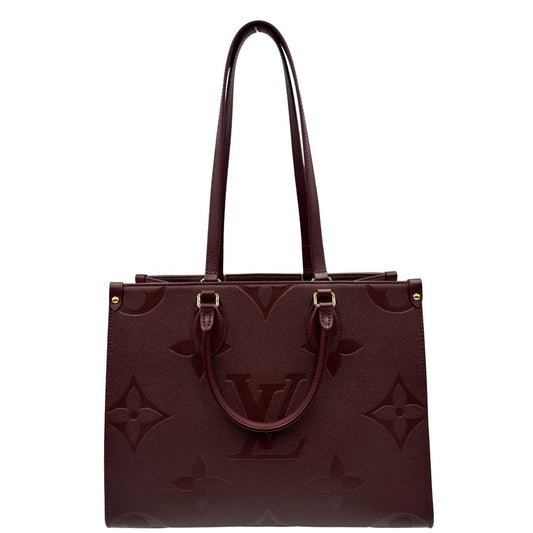 front  Louis Vuitton OnTheGo nella versione MM in pelle monogram Empreinte color bordeaux, di lusso, originale, ottime condizioni, usata. 