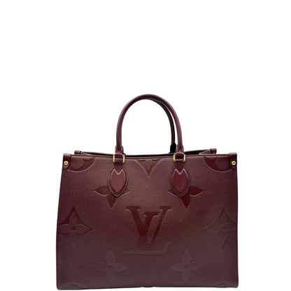 front  Louis Vuitton OnTheGo nella versione MM in pelle monogram Empreinte color bordeaux, di lusso, originale, ottime condizioni, usata. 