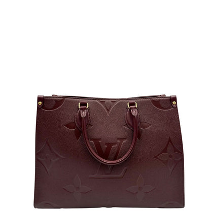 retro  Louis Vuitton OnTheGo nella versione MM in pelle monogram Empreinte color bordeaux, di lusso, originale, ottime condizioni, usata. 