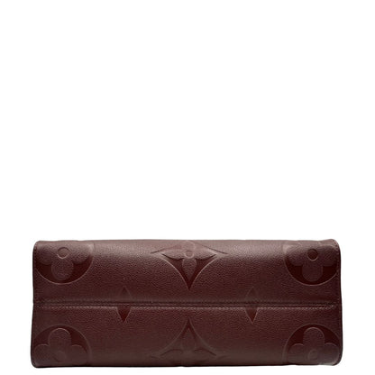 base Louis Vuitton OnTheGo nella versione MM in pelle monogram Empreinte color bordeaux, di lusso, originale, ottime condizioni, usata. 
