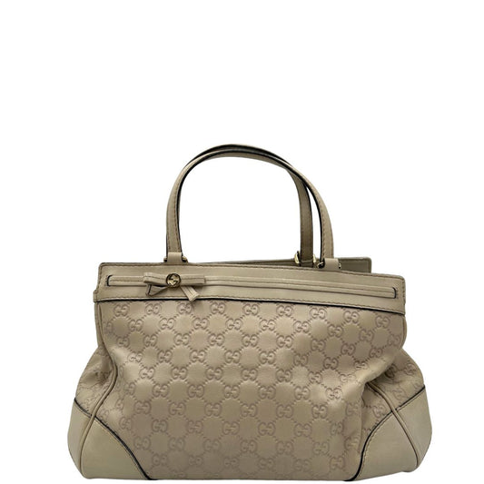 front  Borsa Gucci in pelle color bianco latte GG munita di doppi manici, di lusso, originale, ottime condizioni, usata  