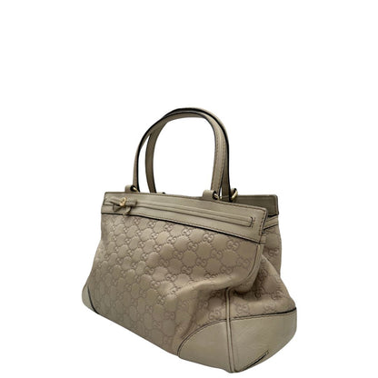 lato  Borsa Gucci in pelle color bianco latte GG munita di doppi manici, di lusso, originale, ottime condizioni, usata  