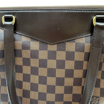 Borsa Louis Vuitton in canvas Damier Ébène con finiture in pelle marrone e dettagli hardware dorati, di lusso, originale, ottime condizioni, usata.
