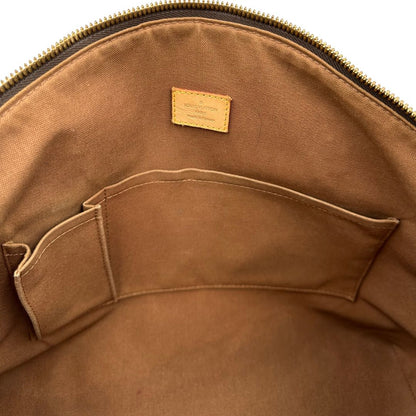 interno Borsa Louis Vuitton in tela Monogram con finiture in vacchetta naturale e dettagli hardware dorati. Design elegante, da portare a spalla, di lusso, originale, ottime condizioni, usata. 