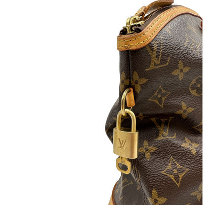 Borsa Louis Vuitton in tela Monogram con finiture in vacchetta naturale e dettagli hardware dorati. Design elegante, da portare a spalla, di lusso, originale, ottime condizioni, usata.