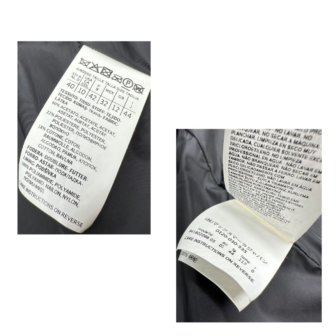 Cappotto Max Mara in pelliccia effetto astrakan nera, caratterizzato da texture ricca e sofisticata.