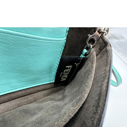 interno  Baguette Fendi Monster in pelle color turchese 