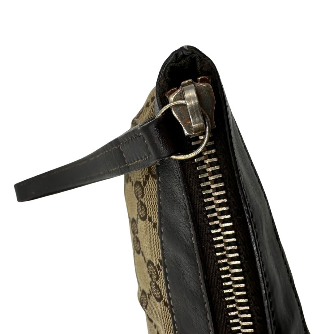 Borsa Gucci realizzata in tessuto beige con motivo GG di lusso, originale, ottime condizioni