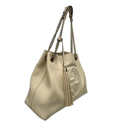 lato Borsa Gucci in pelle color bianco avorio munita di doppi manici, indossabile a spalla, di lusso, originale, ottime condizioni, usata. 