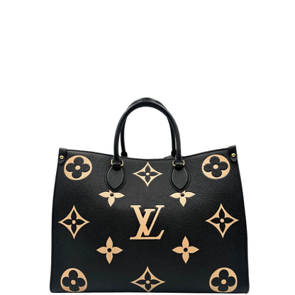 front Louis Vuitton OnTheGo nella versione MM in pelle monogram Empreinte bicolor, nera e color crema, di lusso, originale, ottime condizioni, usata. 
