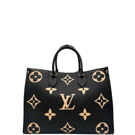 front Louis Vuitton OnTheGo nella versione MM in pelle monogram Empreinte bicolor, nera e color crema, di lusso, originale, ottime condizioni, usata. 