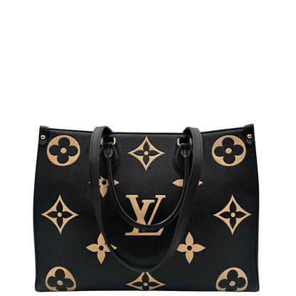 retro Louis Vuitton OnTheGo nella versione MM in pelle monogram Empreinte bicolor, nera e color crema, di lusso, originale, ottime condizioni, usata. 
