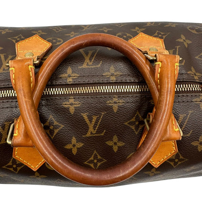 manici Speedy Louis Vuitton in canvas marrone monogram nella misura 40, di lusso, originale, ottime condizioni, usato. 