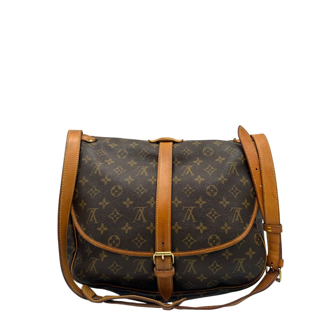 retro Borsa Saumur LV monogram nella misura 35 realizzata in canvas monogram e finiture in vacchetta naturale, di lusso, originale, ottime condizioni, usata