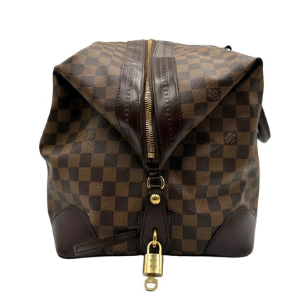 lato  Borsone Louis Vuitton in canvas Damier Ébène con finiture in pelle marrone e dettagli hardware dorati, di lusso, originale, ottime condizioni, usato. 