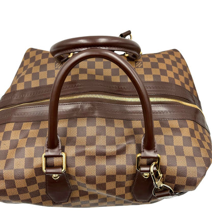 manici  Borsone Louis Vuitton in canvas Damier Ébène con finiture in pelle marrone e dettagli hardware dorati, di lusso, originale, ottime condizioni, usato. 