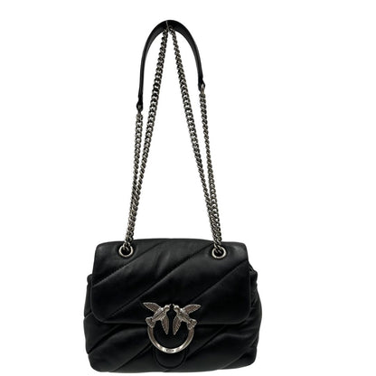 Front, Borsa Love Bag Puff nella versione piccola in morbida nappa nera con maxi trapuntatura obliqua, hardware argentato. Indossabile a spalla oppure a tracolla. Originale, usata, di lusso, in ottime condizioni.