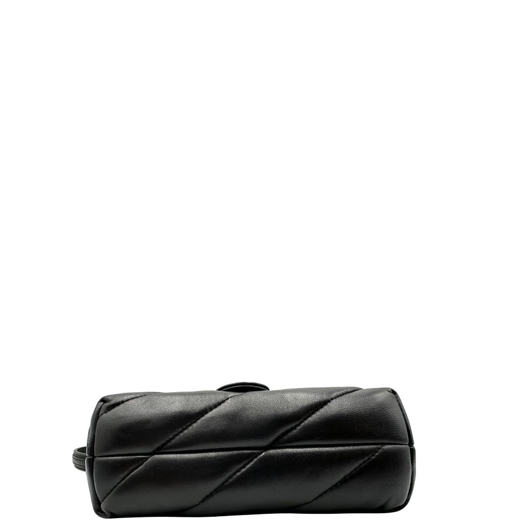 Base, Borsa Love Bag Puff nella versione piccola in morbida nappa nera con maxi trapuntatura obliqua, hardware argentato. Indossabile a spalla oppure a tracolla. Originale, usata, di lusso, in ottime condizioni.
