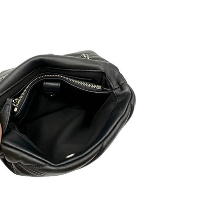 Interno, Borsa Love Bag Puff nella versione piccola in morbida nappa nera con maxi trapuntatura obliqua, hardware argentato. Indossabile a spalla oppure a tracolla. Originale, usata, di lusso, in ottime condizioni.