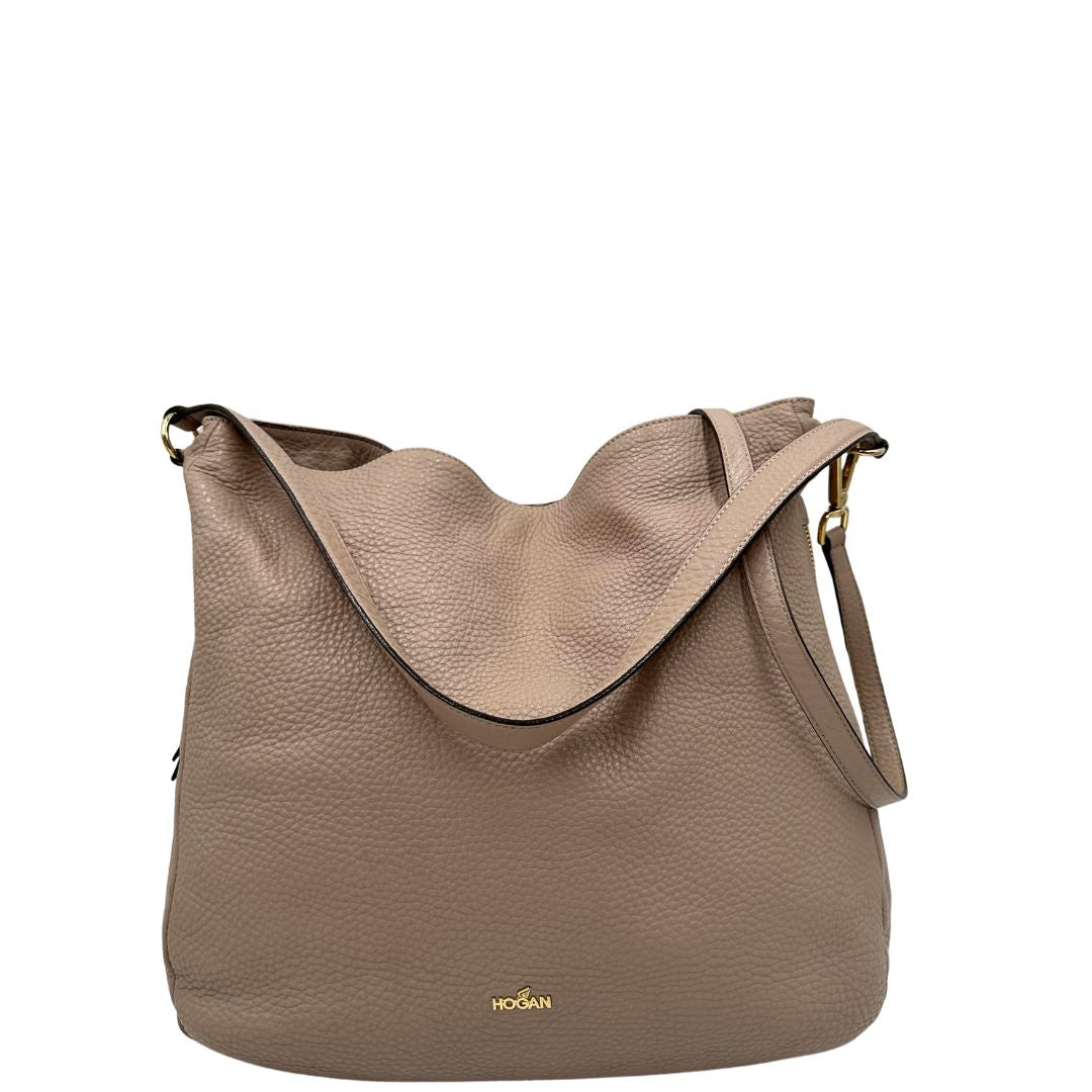 front Borsa Hogan in pelle martellata color rosa cipria e hardware dorato, di lusso, originale, ottime condizioni, usata.