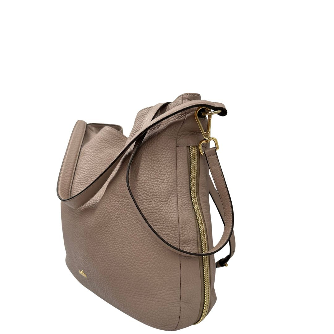 Borsa Hogan in pelle martellata color rosa cipria e hardware dorato, di lusso, originale, ottime condizioni, usata.