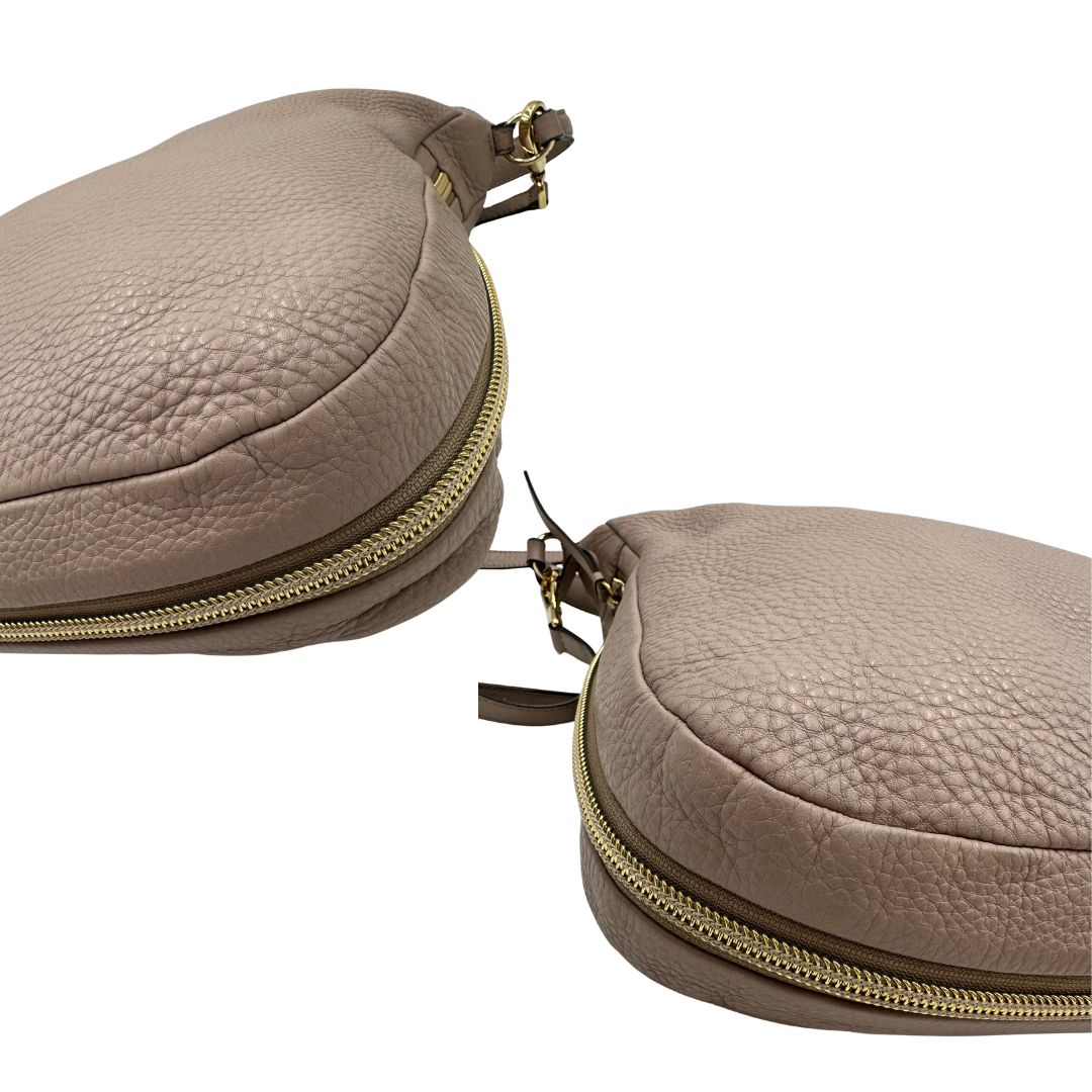 Borsa Hogan in pelle martellata color rosa cipria e hardware dorato, di lusso, originale, ottime condizioni, usata.