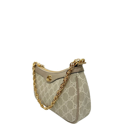 lato Borsa Gucci realizzata in canvas GG Supreme color sabbia con finiture in pelle beige e hardware dorato, di lusso, originale, eccellenti condizioni.
