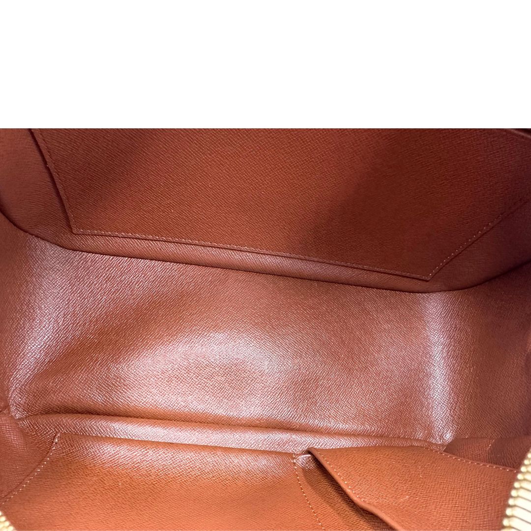 Interno, Louis Vuitton Cite in canvas monogram marrone e hardware dorato; Indossabile a spalla. Originale, usata, di lusso, in ottime condizioni.