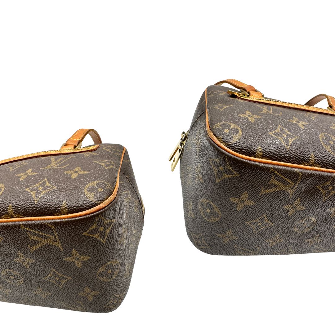 Angoli, Louis Vuitton Cite in canvas monogram marrone e hardware dorato; Indossabile a spalla. Originale, usata, di lusso, in ottime condizioni.