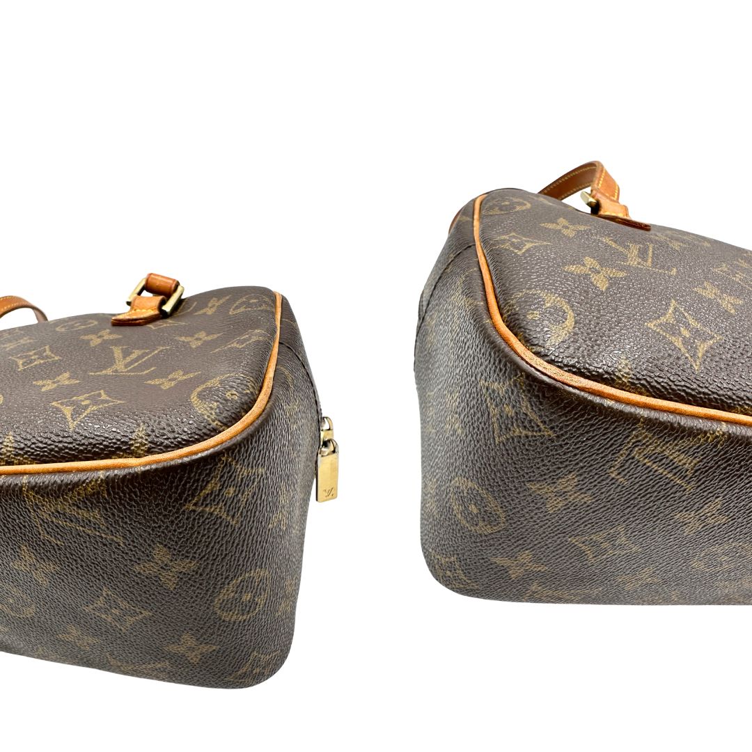 Angoli, Louis Vuitton Cite in canvas monogram marrone e hardware dorato; Indossabile a spalla. Originale, usata, di lusso, in ottime condizioni.