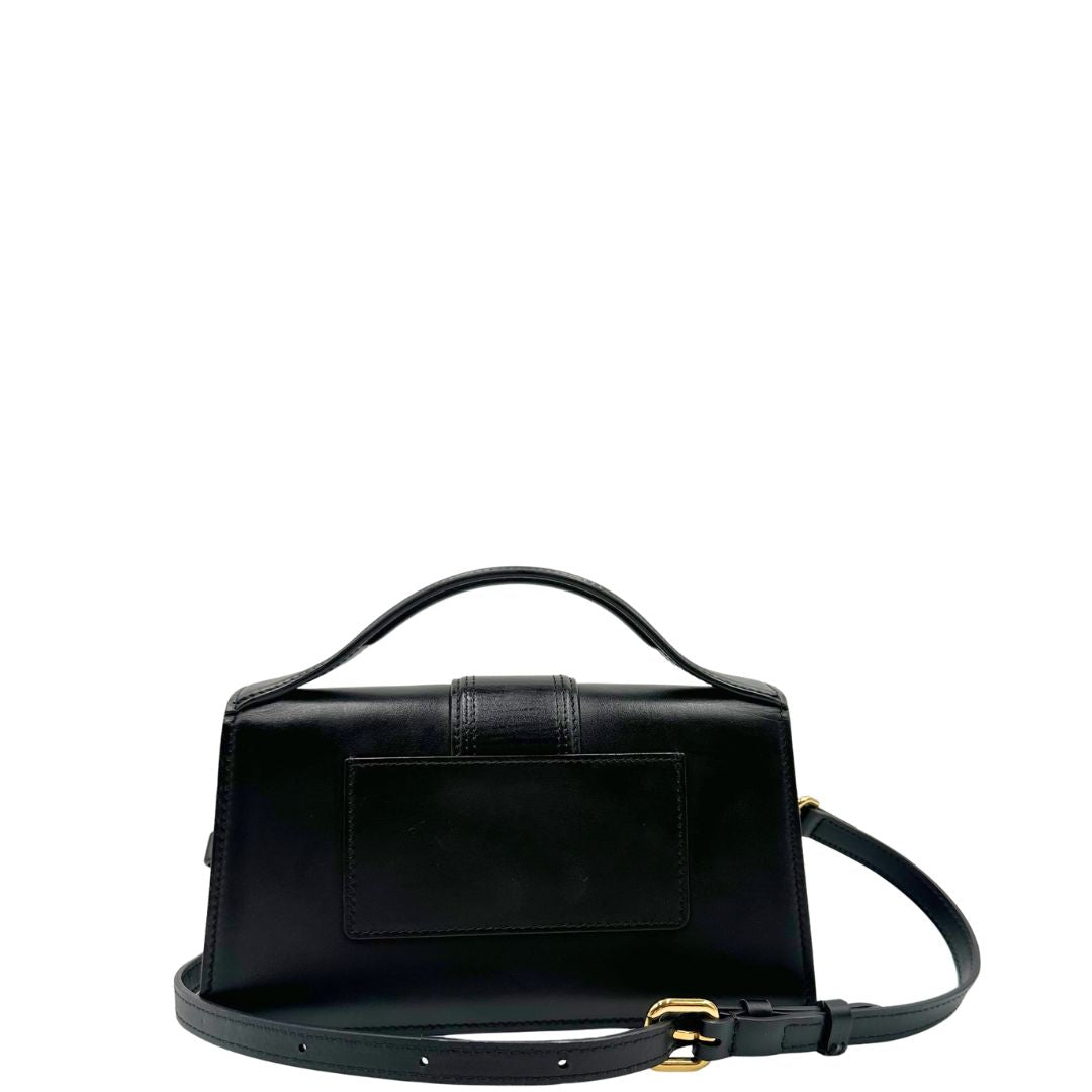 retro  Borsa Jacquemus nella versione Le Grand Bambino in pelle nera, da portare a mano o a tracolla, di lusso, originale, ottime condizioni, usata.