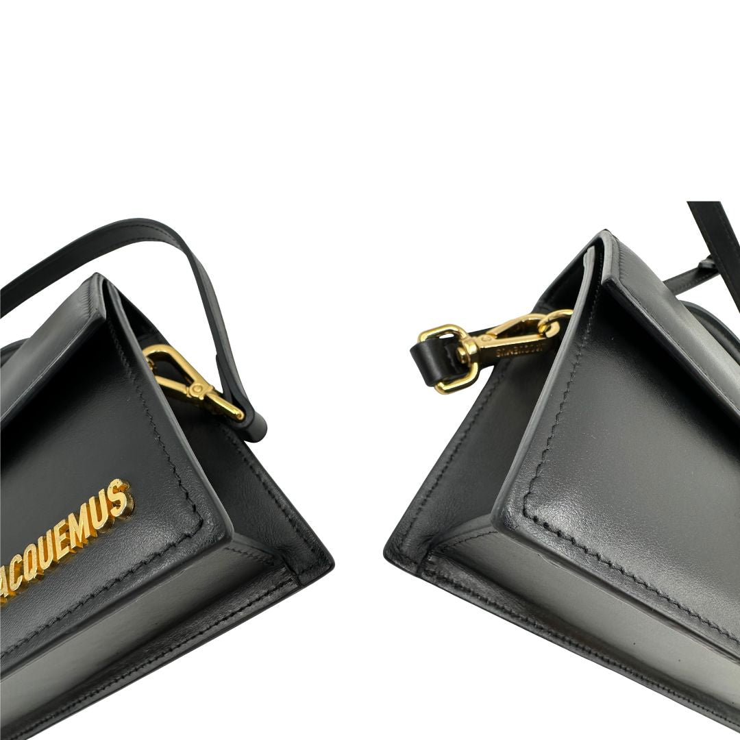 angoli  Borsa Jacquemus nella versione Le Grand Bambino in pelle nera, da portare a mano o a tracolla, di lusso, originale, ottime condizioni, usata. 