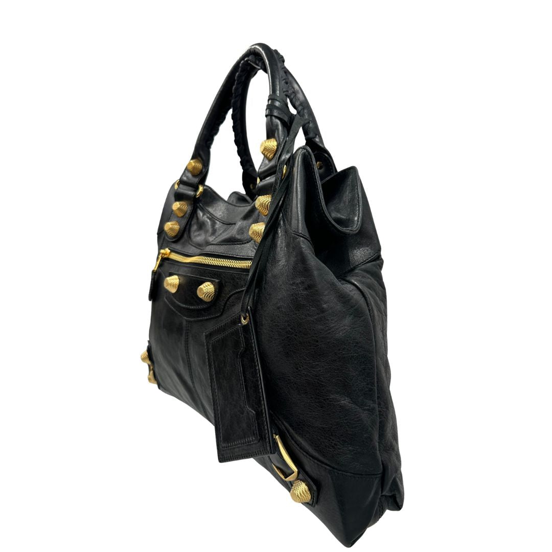 Borsa Balenciaga in pelle Arena nera con hardware dorato e doppi manici stondati, di lusso, originale, ottime condizioni, usata.