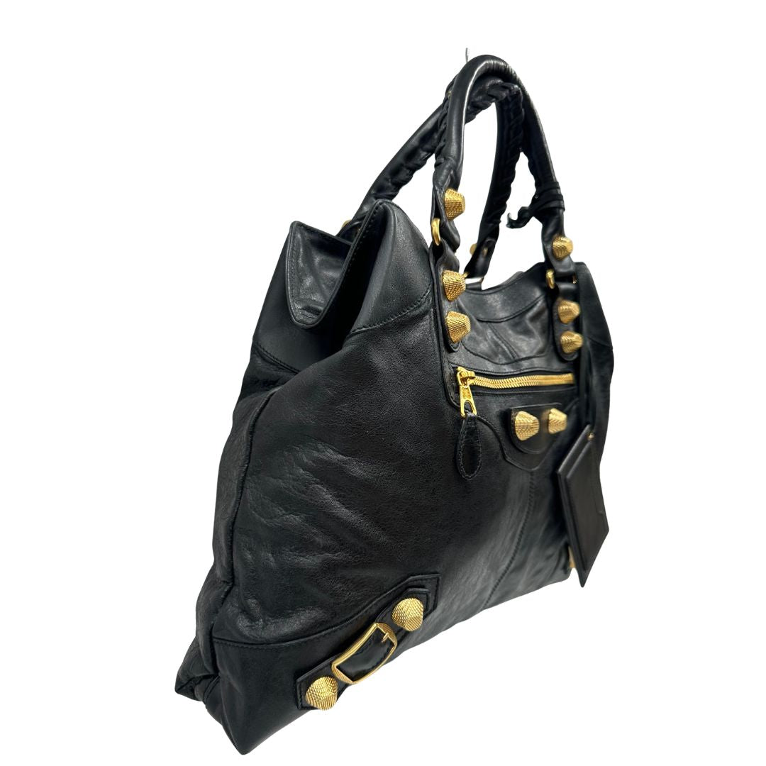 Borsa Balenciaga in pelle Arena nera con hardware dorato e doppi manici stondati, di lusso, originale, ottime condizioni, usata.