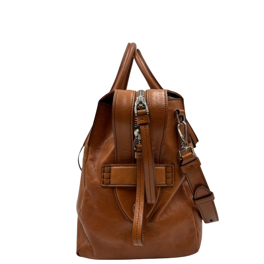  Borsa Tod's in pelle marrone indossabile a tracolla, a spalla o a mano, di lusso, originale, ottime condizioni.