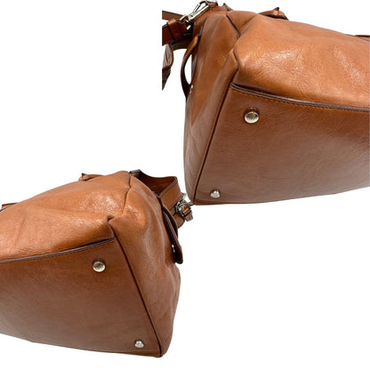  Borsa Tod's in pelle marrone indossabile a tracolla, a spalla o a mano, di lusso, originale, ottime condizioni.